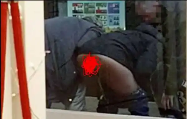 2 Women Pull Down Their Trousers In Broad Daylight To Urinate On A Display Window (See Photos)